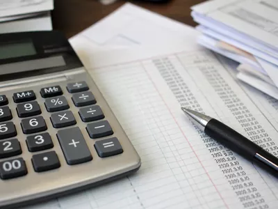 Detail of a calculator and financial ledger