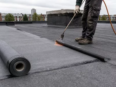 North East Roofing repairing a flat roof with durable materials